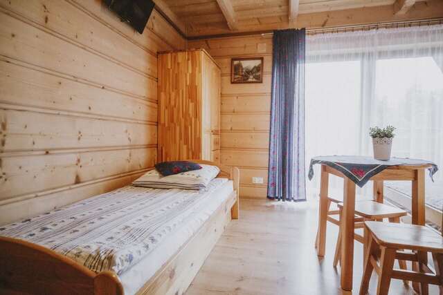 Лоджи Domki i Pokoje obok Term Chochołów U Tadka Хохолув-16