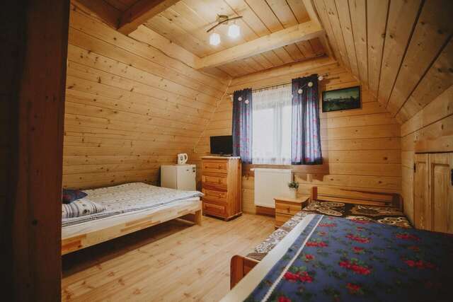 Лоджи Domki i Pokoje obok Term Chochołów U Tadka Хохолув-23