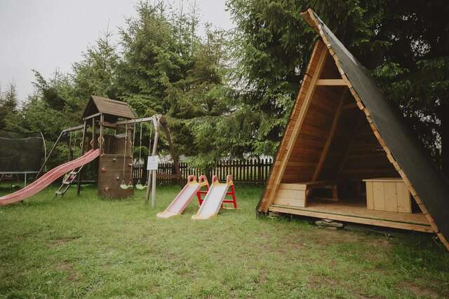 Лоджи Domki i Pokoje obok Term Chochołów U Tadka Хохолув-36