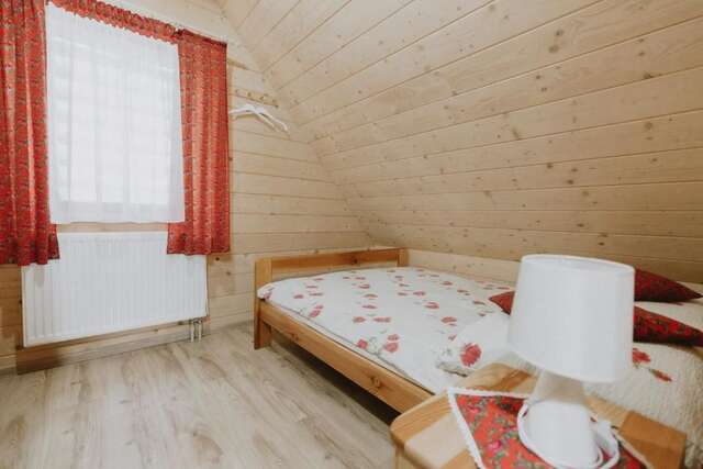 Лоджи Domki i Pokoje obok Term Chochołów U Tadka Хохолув-57